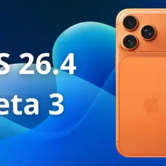 Pomarańczowy iPhone z potrójnym aparatem na tle niebieskich fal. Tekst: iOS 26.4 beta 3.