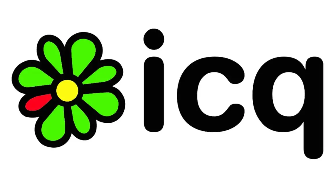 Zielony kwiatek z żółtym środkiem i jednym czerwonym płatkiem obok napisu icq.